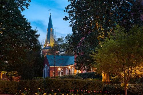 a church with a steeple in the background at 86 State Circle - Luxury Boutique Hotel in Annapolis