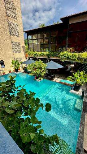 Der Swimmingpool an oder in der Nähe von Zihua Mia Hotel Boutique