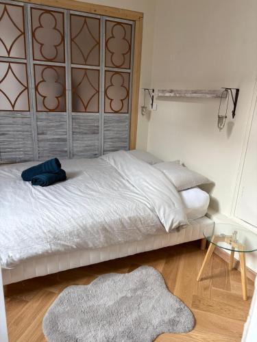 Postel nebo postele na pokoji v ubytování Le Préfecture - Hôtel particulier au coeur de Dijon