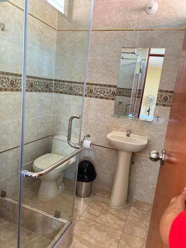 Ένα μπάνιο στο HOTEL SAMANAHUASi