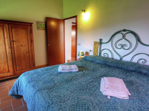 Katil atau katil-katil dalam bilik di Cottage in Tuscany with patio