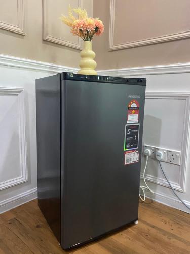 Η κουζίνα ή μικρή κουζίνα στο Syahoney Homestay 2 with NETFLIX