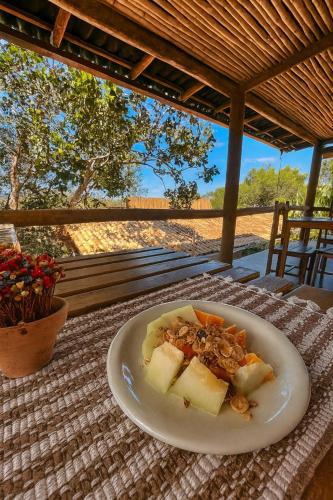 a plate of food on top of a table at Pousada Bella Vista in Serra do Cipo