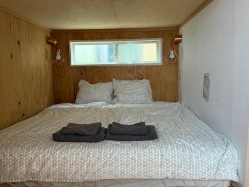 MEEDAFU'S YUI HOSTEL and COFFEEにあるベッド