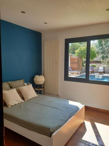 Llit o llits en una habitació de Écrin de verdure