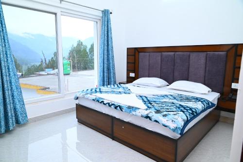 Una cama o camas en una habitación de Hotel Daiwarch
