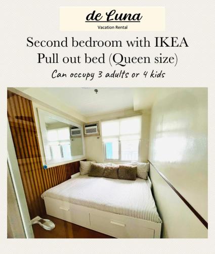 a small bedroom with a bed in a room at de Luna Vacation Rental in Davao City