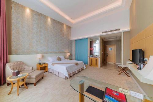 Postel nebo postele na pokoji v ubytování Regency Hotel