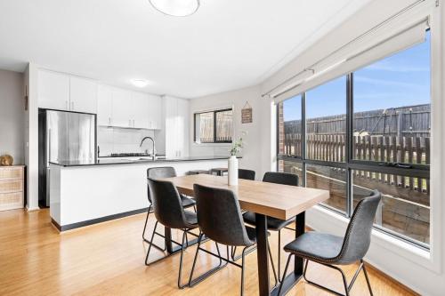 a kitchen and dining room with a table and chairs at Geelong ReGen Living near City in Bell Post Hill