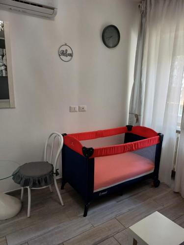 Ένα ή περισσότερα κρεβάτια σε δωμάτιο στο L'appartamentino dei colli