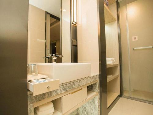 Koupelna v ubytování Echarm Hotel Changchun Jiutai District Government Railway Station