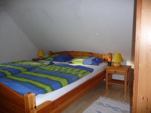 Postel nebo postele na pokoji v ubytování Haus Heverstrom