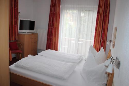 Postel nebo postele na pokoji v ubytování Haus Margit