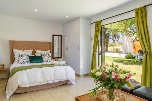 Ένα ή περισσότερα κρεβάτια σε δωμάτιο στο Calais Wine Estate