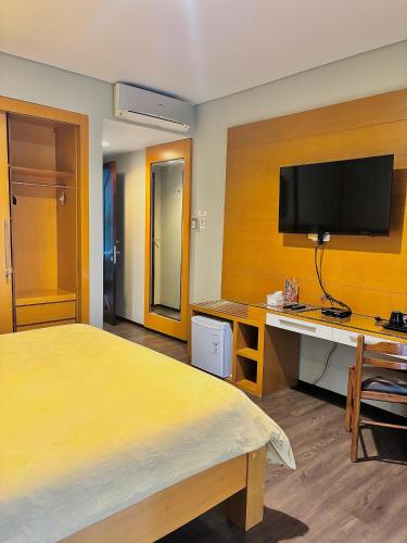 Televisyen dan/atau pusat hiburan di COZY Boutique Guest House