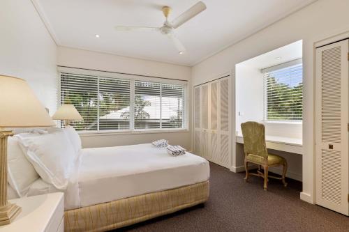 Ένα ή περισσότερα κρεβάτια σε δωμάτιο στο Mirage Resort Villa 434 with access to Sheraton Facilities