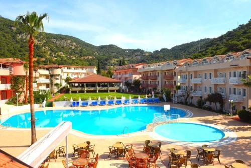 a view of a swimming pool at a resort at Oludeniz Turquoise Hotel - All Inclusive in Oludeniz