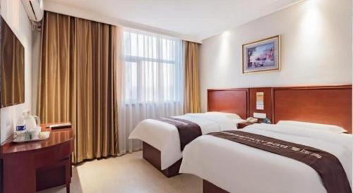 Letto o letti in una camera di GreenTree Inn Beijing Tonzhou Maju Bridge No.2 Express Hotel
