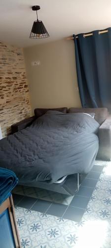 Postel nebo postele na pokoji v ubytování Le Sapin
