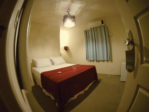 Cama o camas de una habitación en Pousada Vila Moana