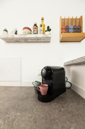 a toaster sitting on a counter in a kitchen at Wies'n Ruhe DTV 4-Sterne in Oberviechtach