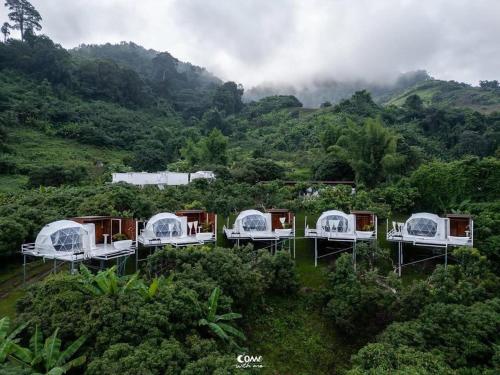 a group of tents in the middle of a mountain at ภูธารา กลางดง in Ban Thung Phan Ha
