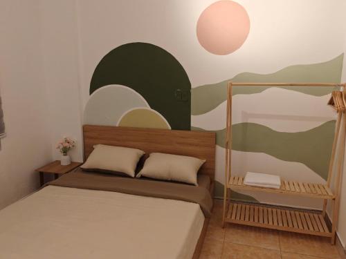 Postel nebo postele na pokoji v ubytování B&N HOUSE l Homestay HUE