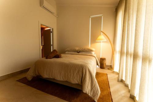 Ένα ή περισσότερα κρεβάτια σε δωμάτιο στο Hygge House - 300m to the beach