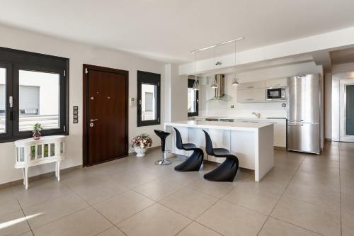Η κουζίνα ή μικρή κουζίνα στο Villa Etheria Luxe