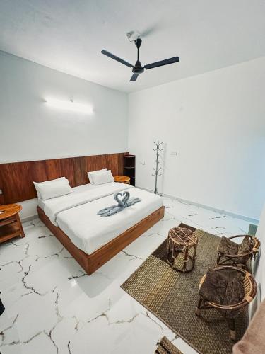 Postel nebo postele na pokoji v ubytování Kuma Surf House