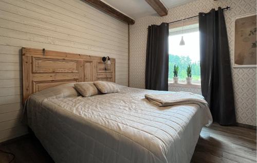 Ένα ή περισσότερα κρεβάτια σε δωμάτιο στο Cozy Home In Bengtsfors With Sauna