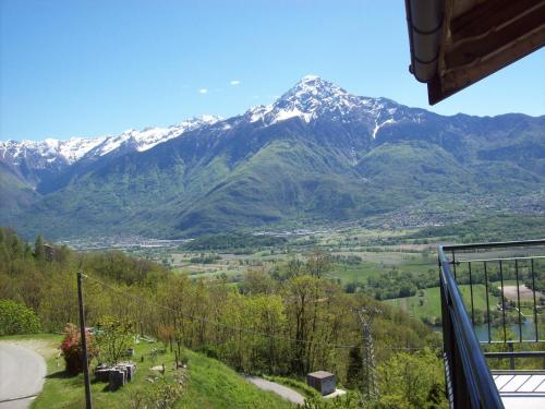 a mountain view from the balcony of a house at Casa delle Camelie in Sorico