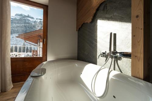 Gambar di galeri bagi Dolomiti Luxury Mountain View SKI-IN SKI-OUT di Canazei