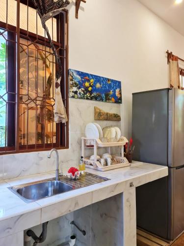 Cucina o angolo cottura di Apartments Zanz J&J Nungwi
