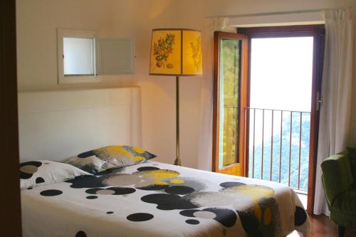 Ένα ή περισσότερα κρεβάτια σε δωμάτιο στο Villa Minuta