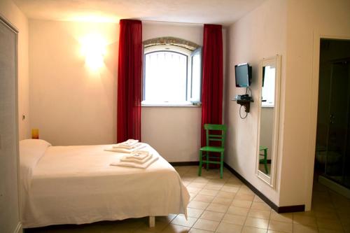 Postel nebo postele na pokoji v ubytování B&B Amphisya
