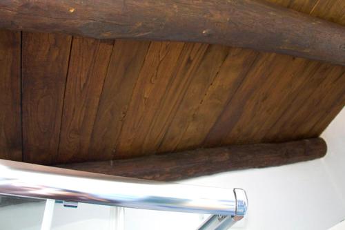 a close up of a wooden ceiling at B&B Amphisya in Roccella Ionica
