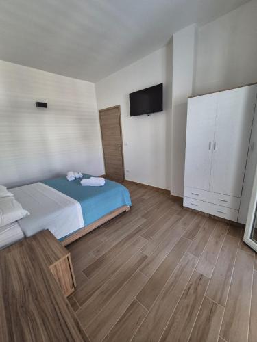 En eller flere senge i et værelse på Casa Picci Appartamento Sun Gallipoli