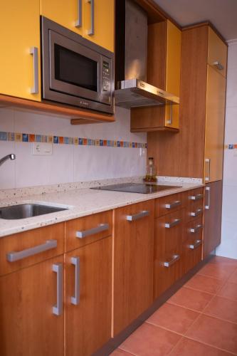 Η κουζίνα ή μικρή κουζίνα στο Apartamento Aurora