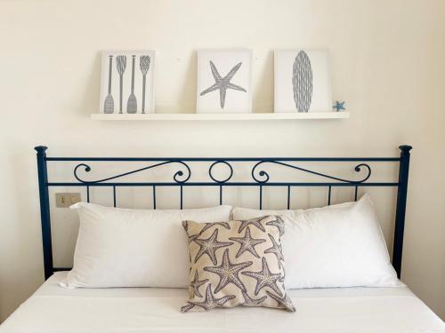 Postel nebo postele na pokoji v ubytování Holihome The Shore Room