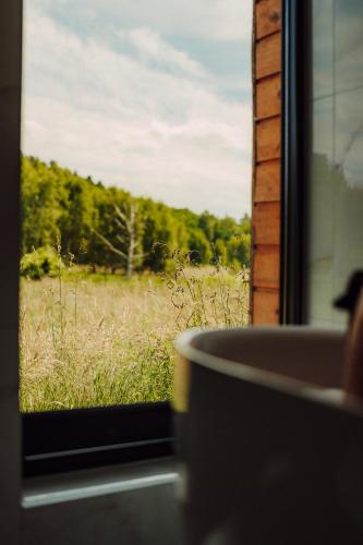 Gambar di galeri bagi Nowoczesne Domki na Łące & Domki na Drzewie - Kołobrzeg - Sauna & Balia - PolanaGlamp di Nieżyn