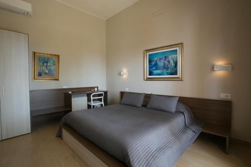 Et værelse på Temenos Villa by Ortigiaapartments