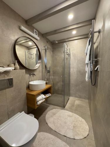 Koupelna v ubytování Arunes Apartments - Daukanto