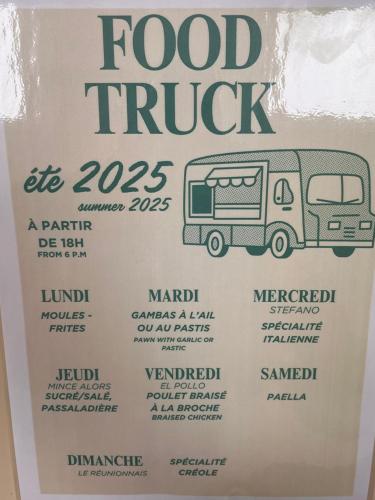 a menu for a food truck with a drawing of a bus at Camping Le Saint Clair in Moustiers-Sainte-Marie