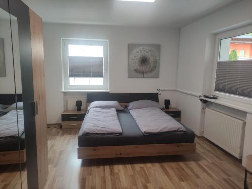 Кровать или кровати в номере Groassehof Haus Gstrein Ferienwohnung 2