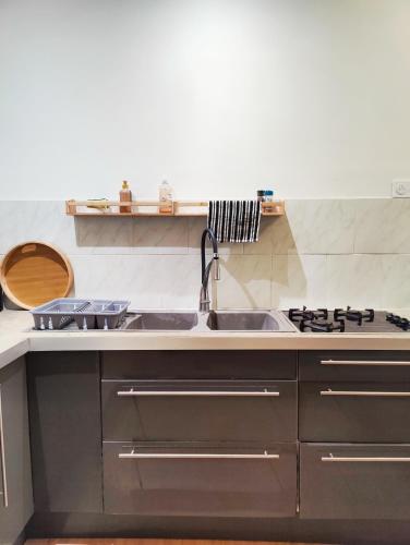 Una cocina o cocineta en Cosy duplex