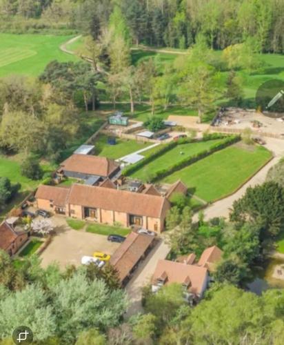 an aerial view of a house with a yard at The Train Carriage in NWI