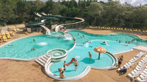 a large swimming pool with people in it at Studio 50 m de la plage 100 m centre ville in Berck-sur-Mer