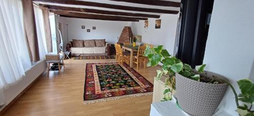 Кровать или кровати в номере Casuta din Deal