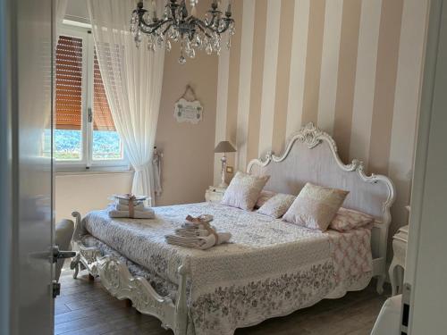 Ένα ή περισσότερα κρεβάτια σε δωμάτιο στο Annali Casa vacanze - Shabby style nella natura